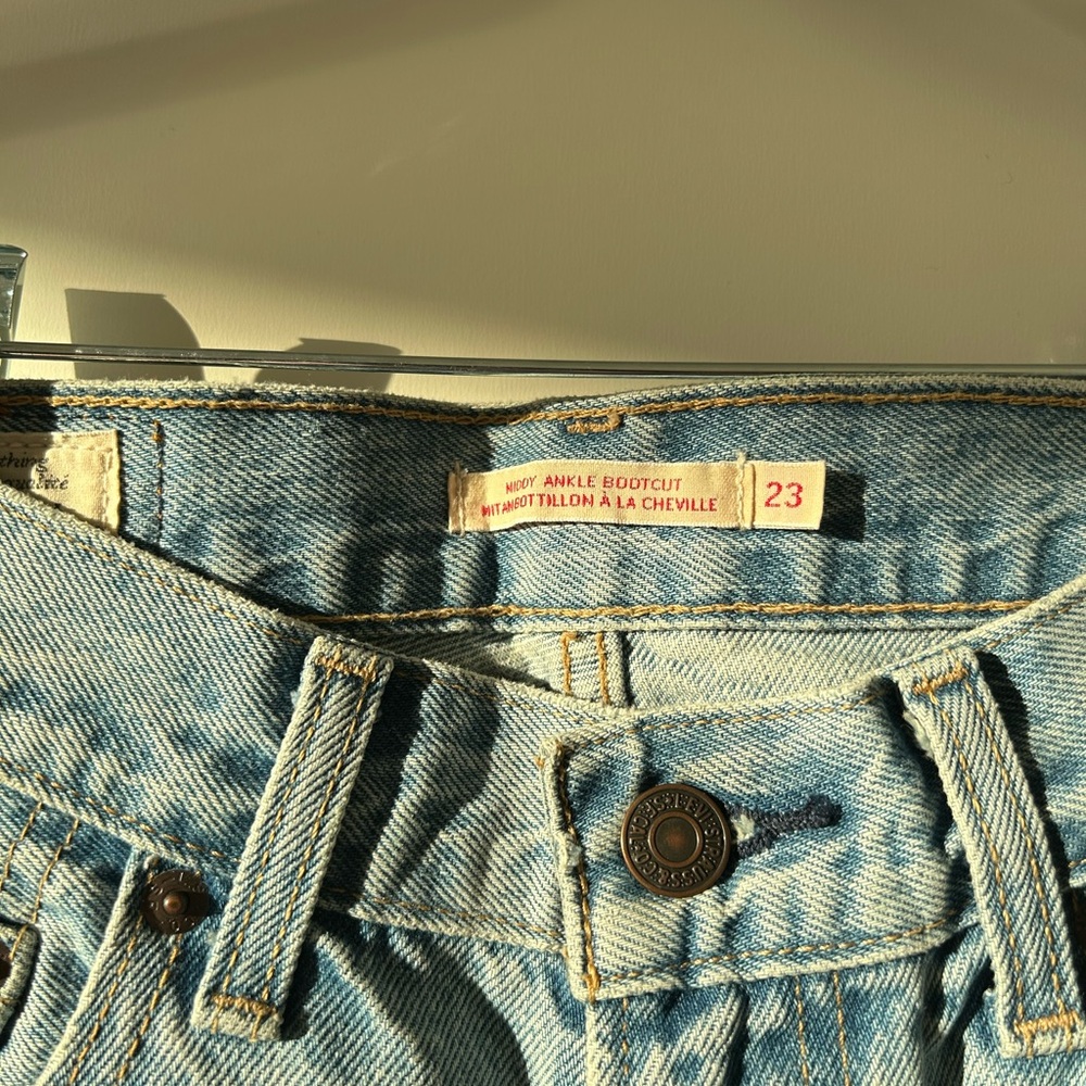 Levi's Light Blue Denim Jeans with Tan Leather Patch